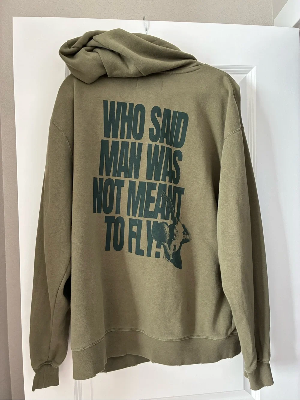 Men Jordan hoodie with graphic text 'WHO SAID MAN WAS NOT MEANT TO FLY?'